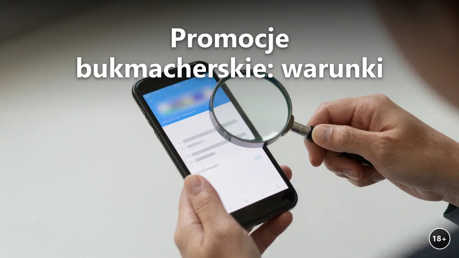 Lupa nad warunkami freebetu na ekranie telefonu